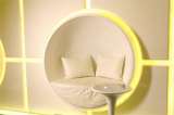 Semi-sphere shaped sitting area made from white fiberglass